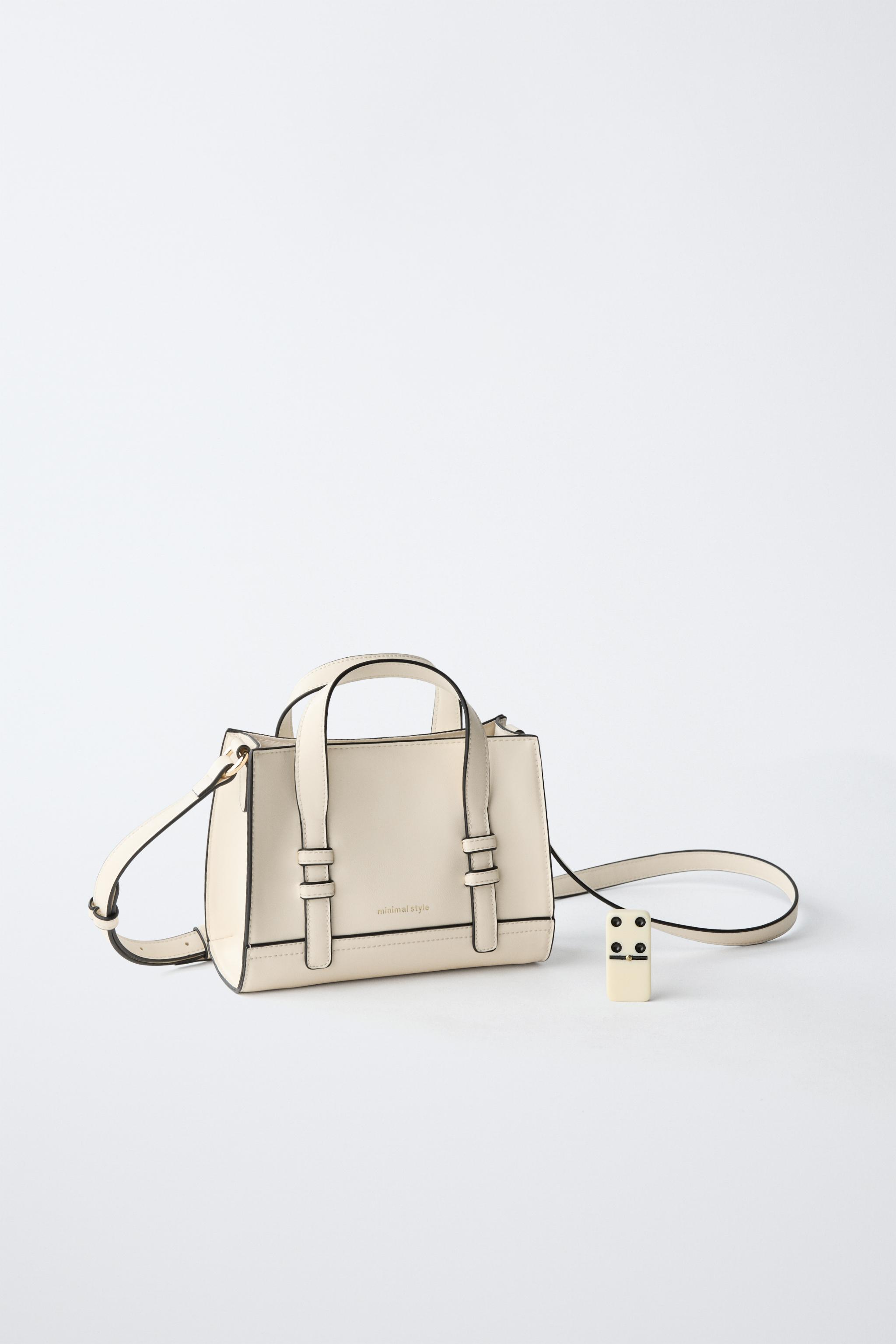 BINDING CROSSBODY BAG